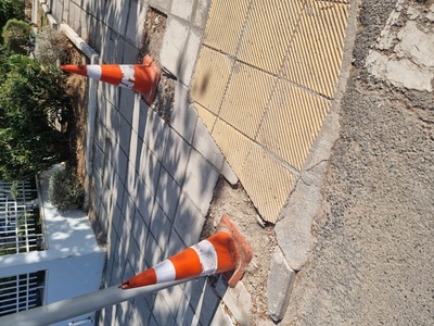 Αποκατάσταση πλακες πεζοδρομίου 