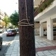 Σ    Καλώδιο τυλιγμένο πάνω  σε  ξύλινη κολόνα  στην  Προύσης