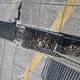 Σπασμενες πλακες και σχάρες σε κανάλι απορροης Εθ. Αντιστάσεως 90