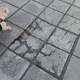 σπασμένα πλακακια στα πεζοδρόμια Αιγαίου από το φανάρι της εθνικής αντιστάσεως