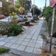 Σκούπισμα πεζοδρομίου μετά από καθαρισμό